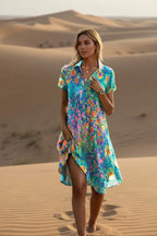 Full-length front view of the floral collared dress showing side slit and short sleeves.