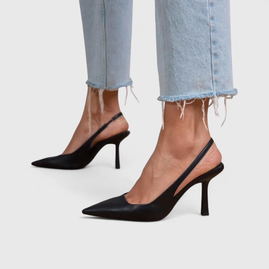 Black leather slingback pump with pointed toe and slim heel, front angle view
