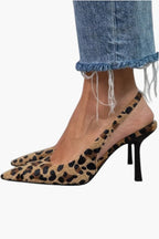 Leopard print pony-hair slingback heel with pointed toe and slim black heel