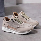 Olive green suede trainer with metallic panel and crystal detail shown on foot