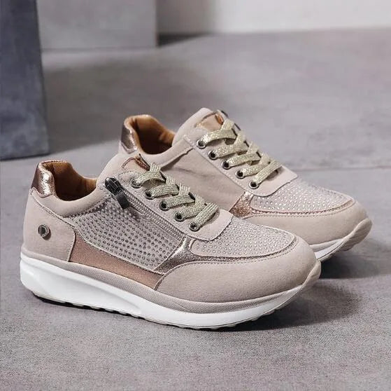Olive green suede trainer with metallic panel and crystal detail shown on foot
